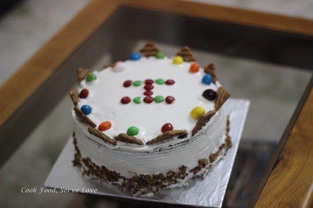 Chocolate cake decorated with M and Ms